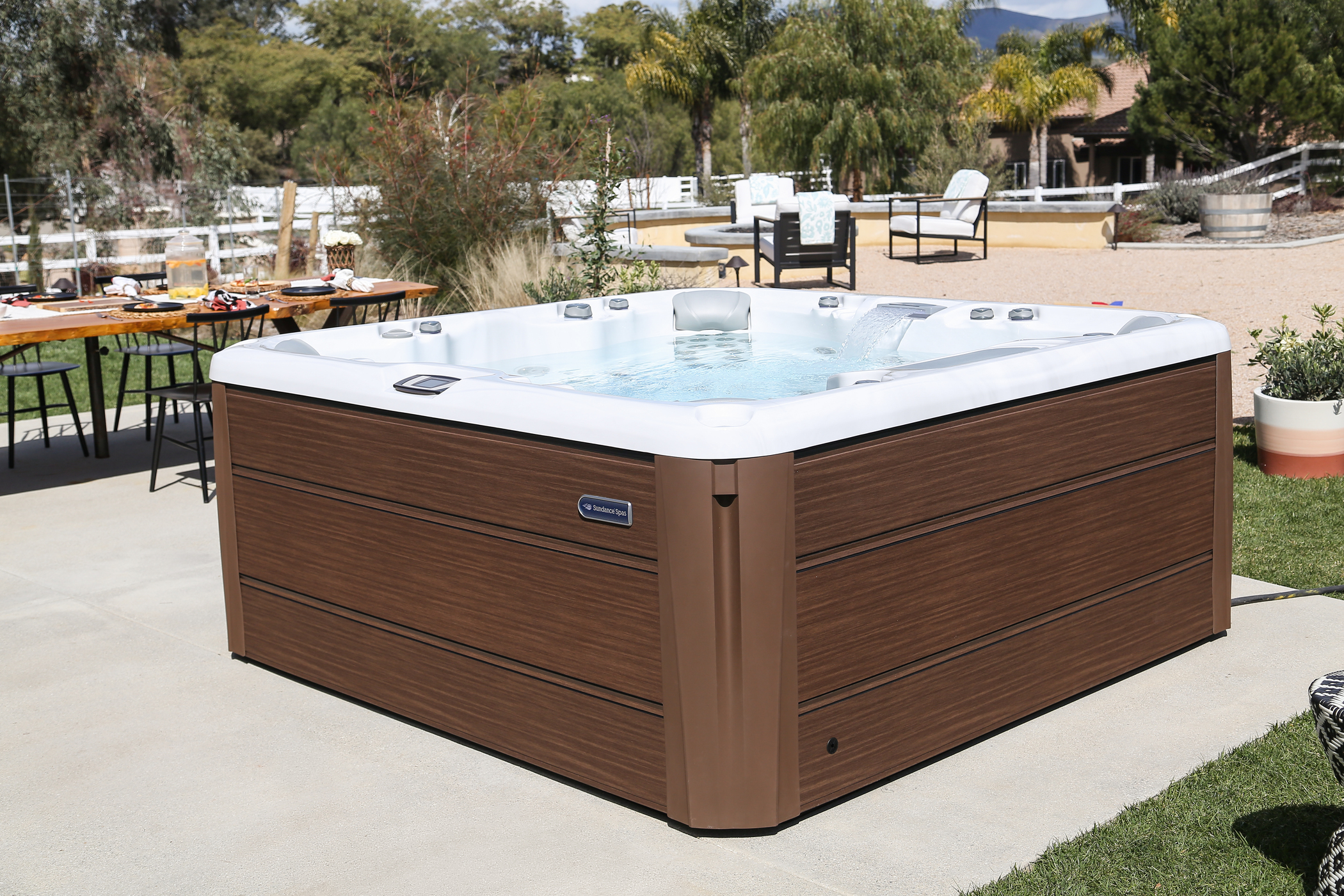 Sundance Spas hot tub installed on a patio