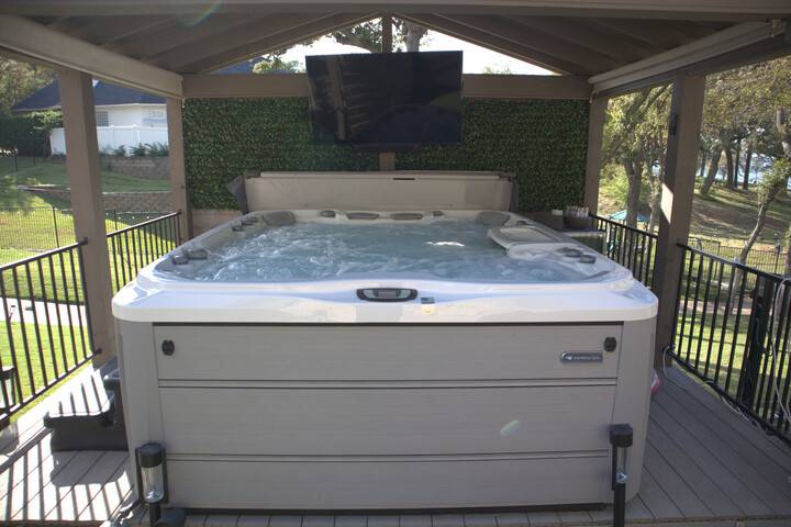 Energy-Efficient Hot Tubs In Long Island: 11 Tips To Save Energy - Aj Spa And Hot Tubs Uncategorized A Grey Hot Tub Under A Gazebo Hot Tub Enclosure